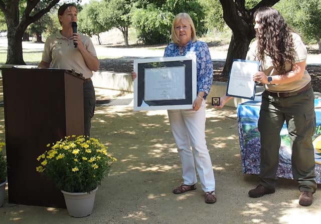 Ann Laverty receiving award